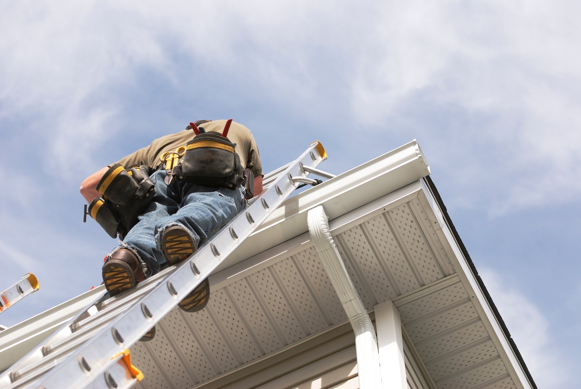 Home Repairs Handyman Up a Ladder outdoors